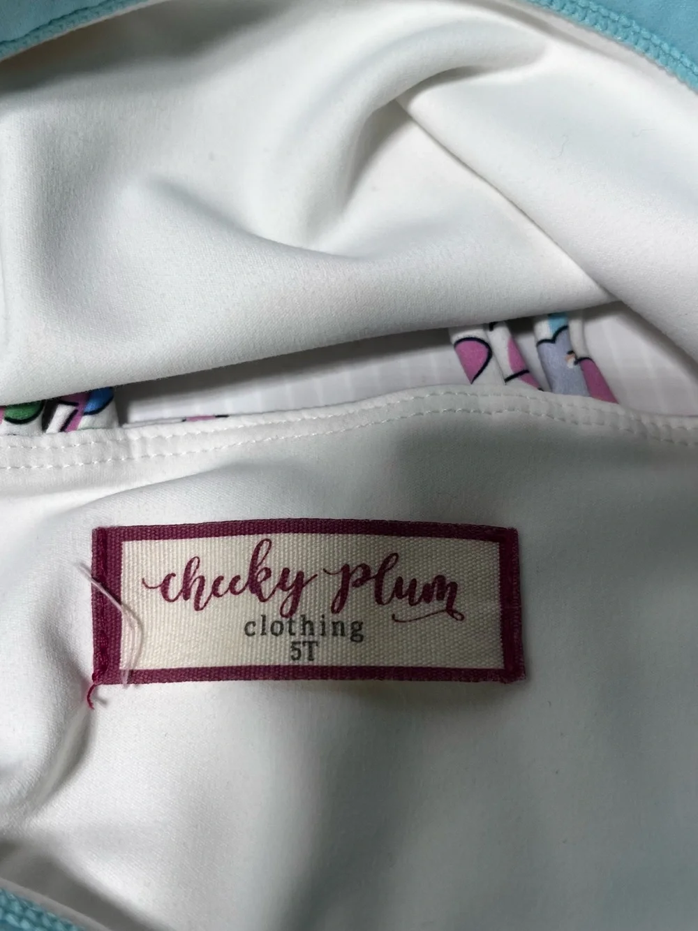 cheeky plum Floral Two-Piece Skort Set in White with Pink, Blue & Green